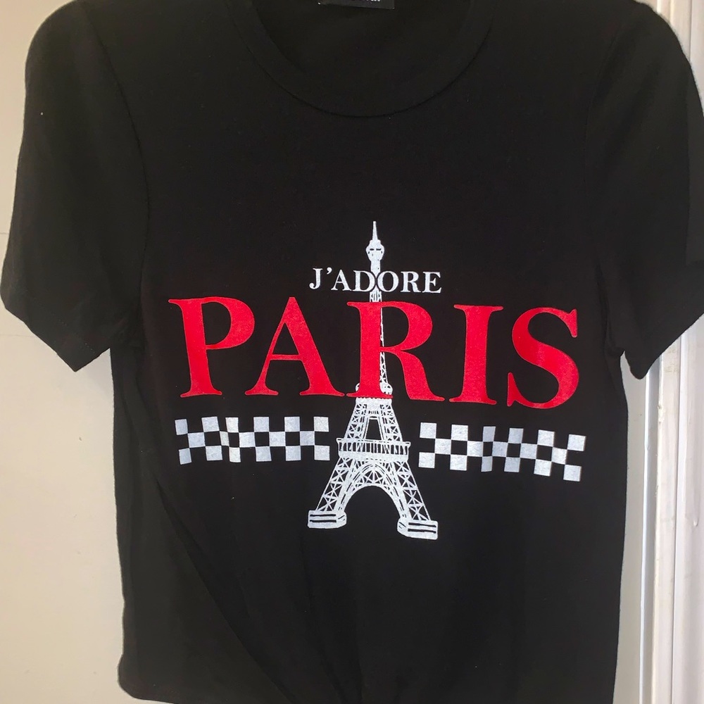 This is a red,white,and black crop top. And it is a size large in jr.